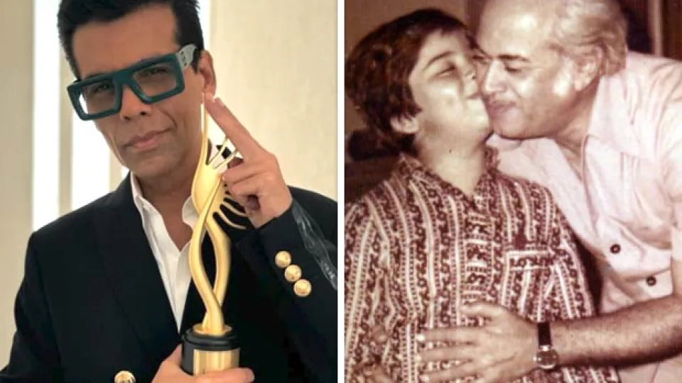 Karan Johar accepting an IIFA honour